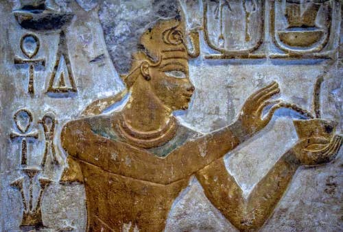 An image of art on a stone wall in ancient Egypt